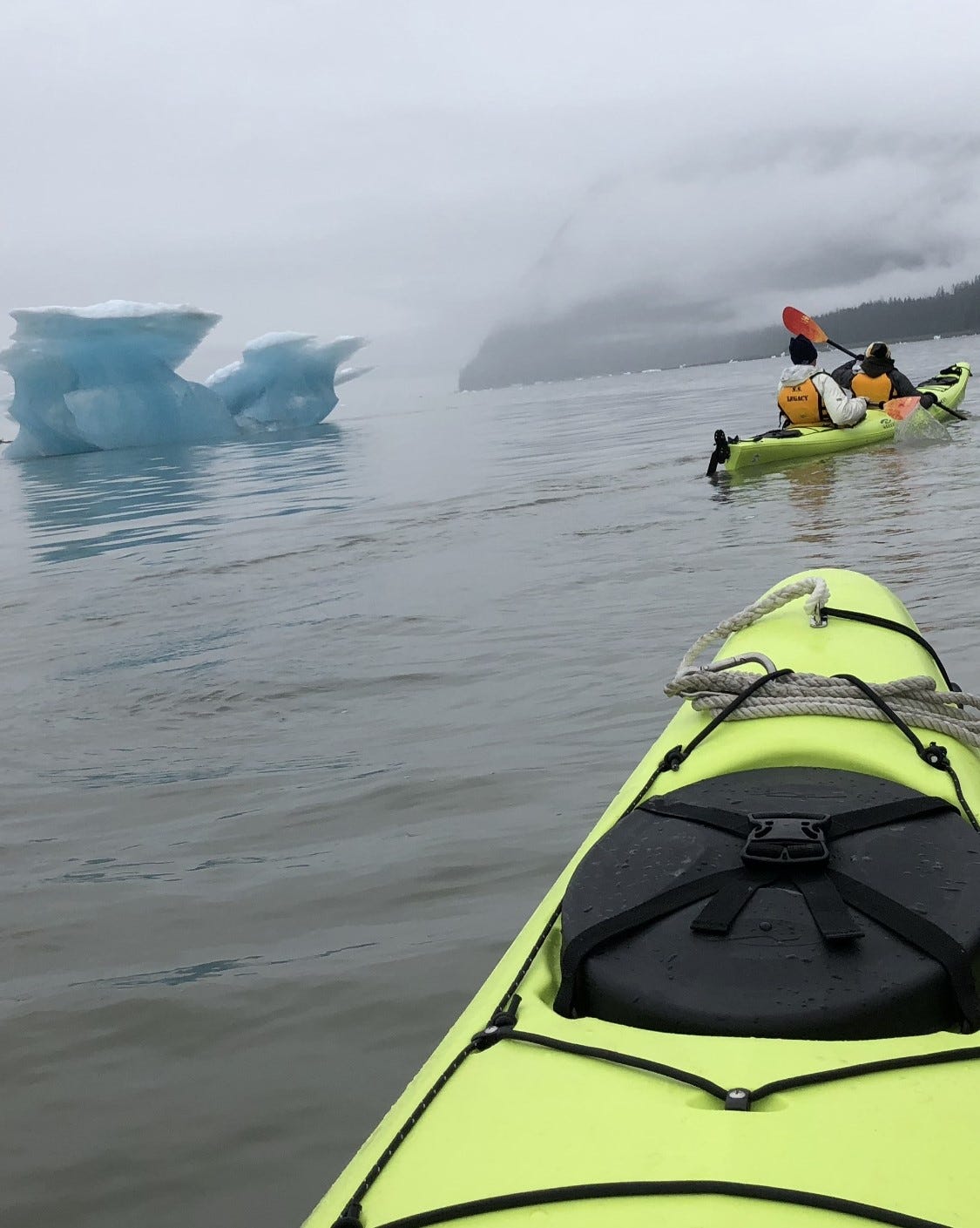 Savio in a kayak navigating an Alaskan glacier, illustrating clarity and discernment.