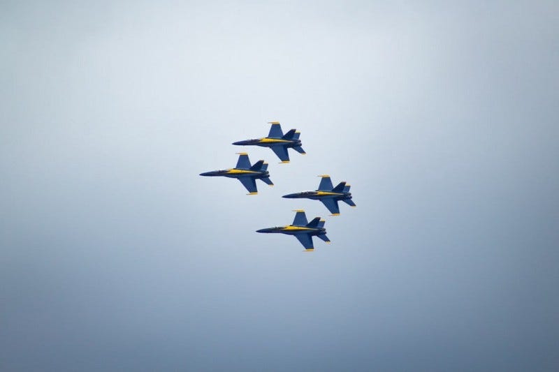four jets flying in formation four jets flying in formation