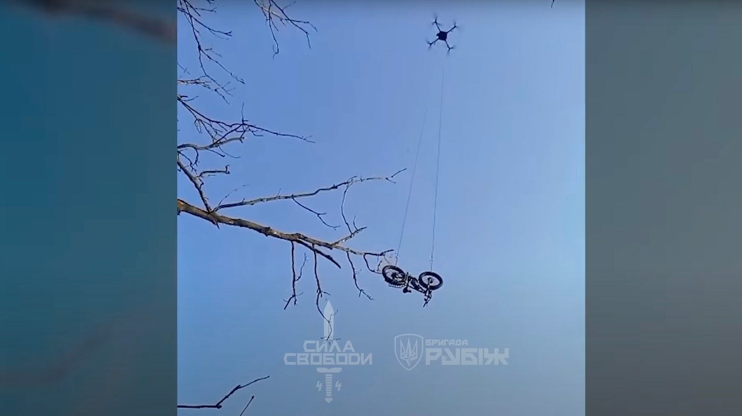Photo of the drone and e-bike in question.