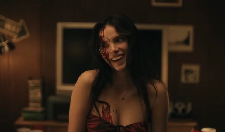 Nikki at the party after she hits herself in the face with a bottle. Nikki at the party after she hits herself in the face with a bottle.