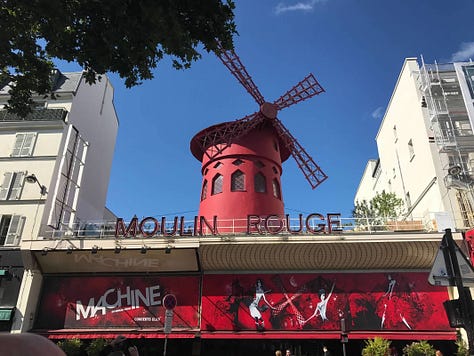 The author's pictures at the Louvre, Montremarte, Moulin rouge, and some city views