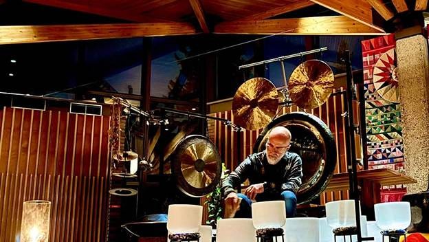 A person playing a drum set

AI-generated content may be incorrect.