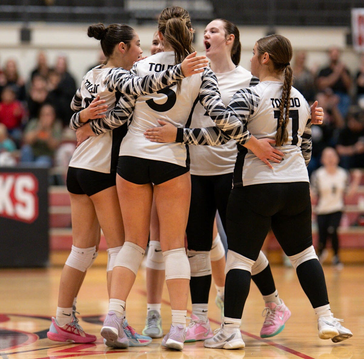The Riverhawks celebrate after scoring a point during Toledo's win over Adna on Sept. 25. The Riverhawks celebrate after scoring a point during Toledo's win over Adna on Sept. 25.