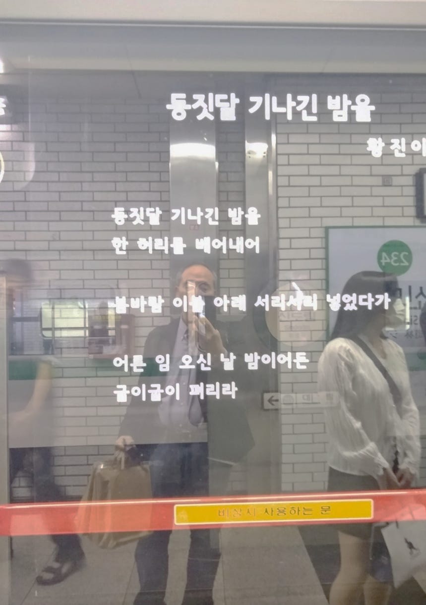 A person and person standing in a subway

AI-generated content may be incorrect.