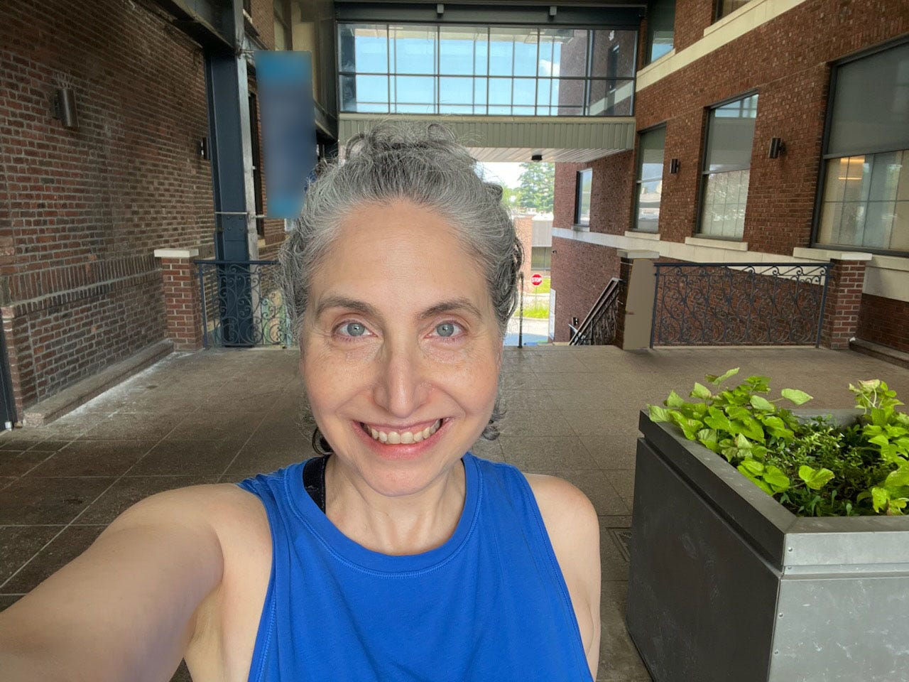 Selfie of me smiling outside after the photo shoot