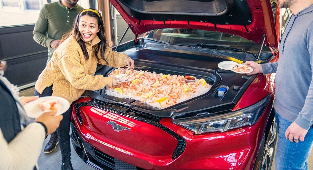 Ford Mustang Mach-E's Frunk Works Perfectly For Tailgate Parties | Carscoops Ford Mustang Mach-E's Frunk Works Perfectly For Tailgate Parties | Carscoops