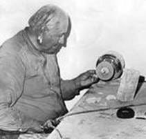 A person working on a piece of paper

AI-generated content may be incorrect.