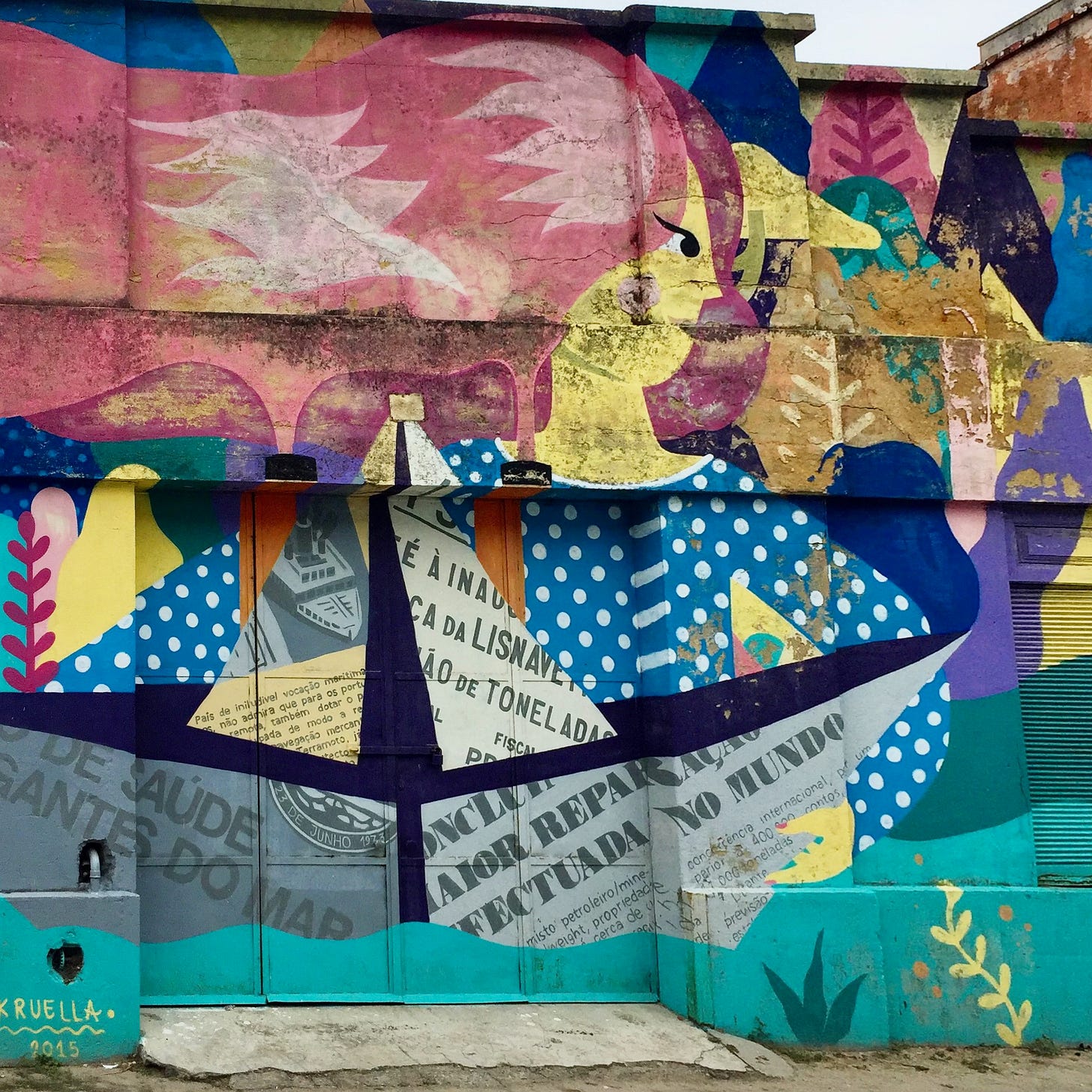 colorful Mural by Kruella (2015) in Almada-Cova de Piedade, Portugal taken in 2018