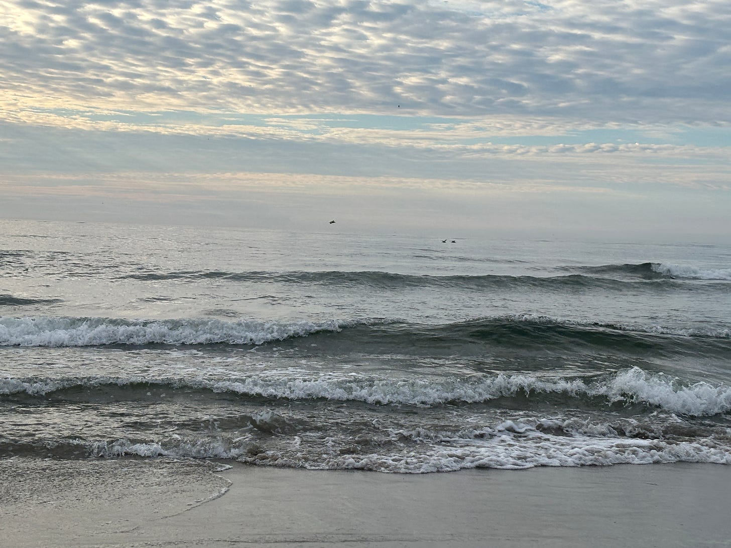 ocean waves landing on the beach