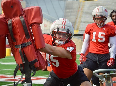 Wisconsin outside linebackers participate in individual position drills during the Badgers' spring football practice Saturday inside Camp Randall Stadium.