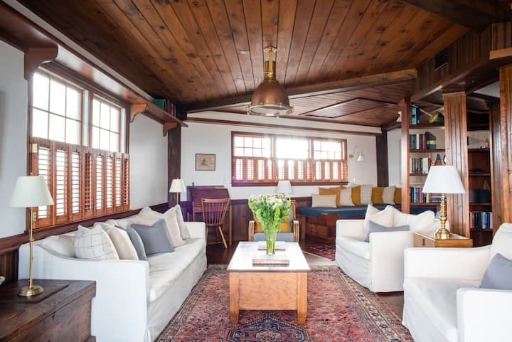 Past the living room is the tv and reading nook filled with art books and novels. 