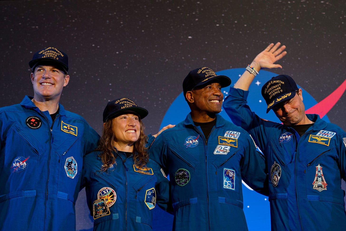 Image may contain Darren Woodson Kaleigh Fratkin Adult Person Baseball Cap Cap Clothing Hat and Officer