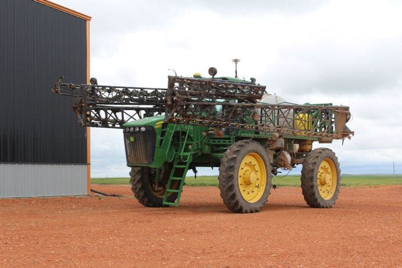 Tractor with sprayer
