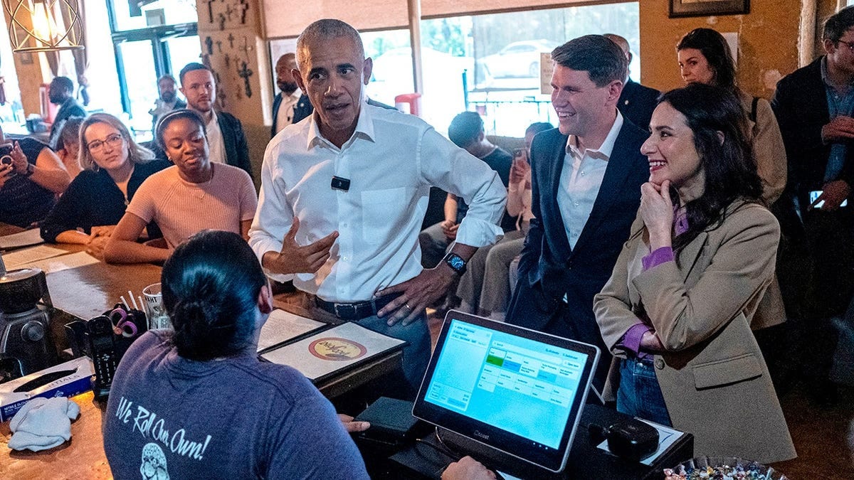 Former President Barack Obama, James Talarico, and Gina Hinojosa meet patrons at Taco Joint restaurant. Former President Barack Obama, James Talarico, and Gina Hinojosa meet patrons at Taco Joint restaurant.