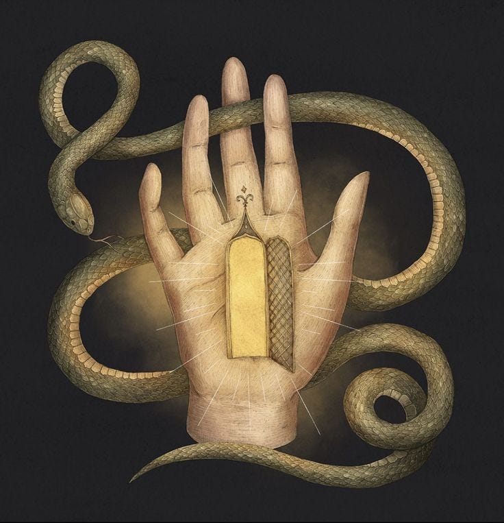 This may contain: a hand with a tag on it is surrounded by snakes