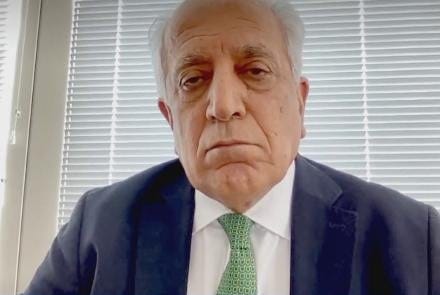 A person in a suit

Description automatically generated with medium confidence