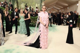 Image may contain Sarah Paulson Clothing Footwear Shoe Adult Person Formal Wear Dress Wedding and Wristwatch
