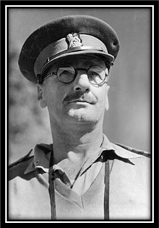 Brigadier R.J.H. Risson DSO, OBE, Chief Engineer, 2nd Australian Corp, watching a military demonstration of tank and infantry attack methods at Atherton Tablelands, QLD, 1943