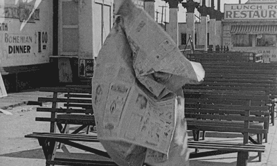 Newspaper Pulling GIF