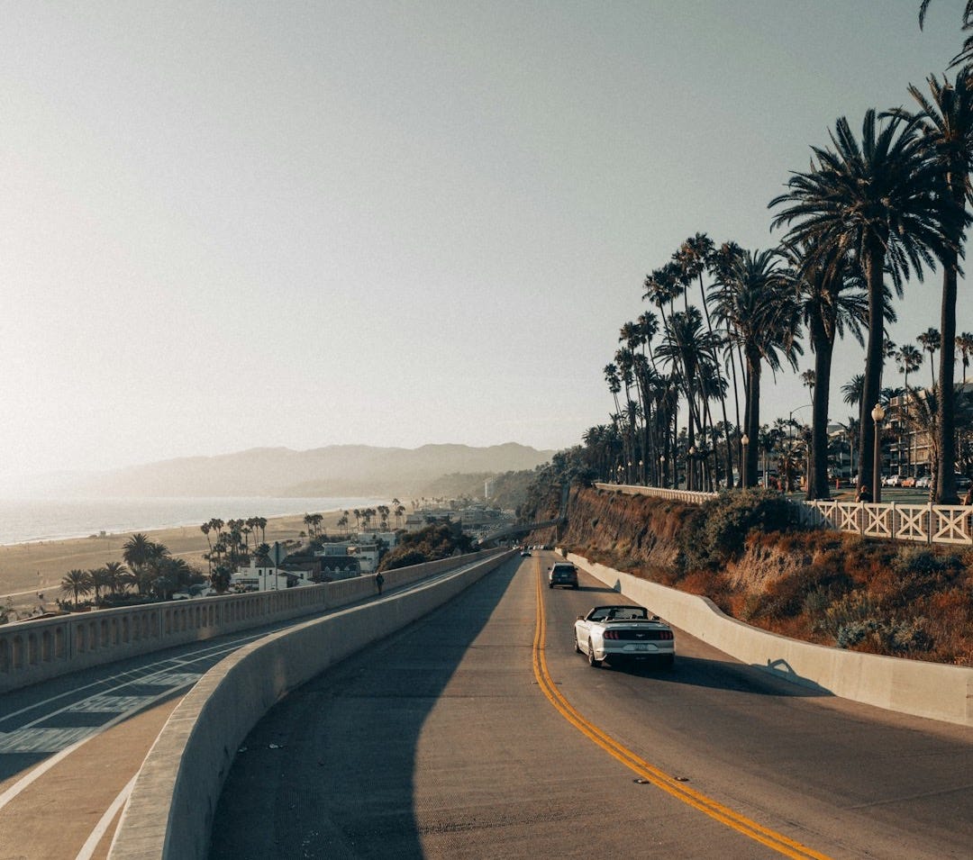 black car on road during daytime