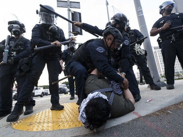 https://media.breitbart.com/media/2025/06/la-ice-raid-riot-arrest-getty-640x480.jpg