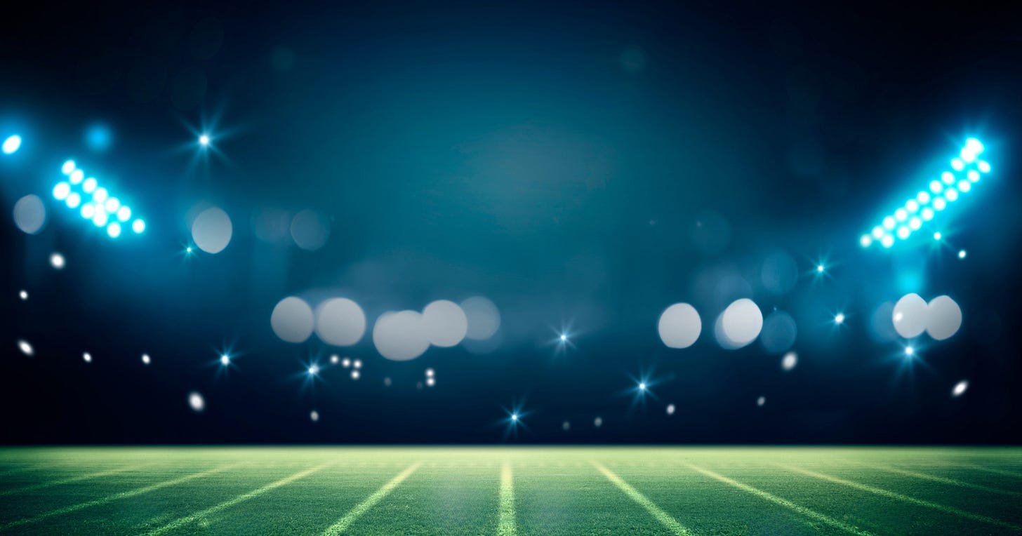 floodlights shining on a field