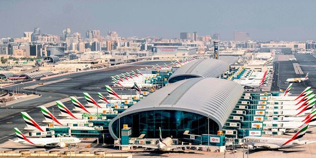 Emirates aircraft at Dubai International Airport. Emirates aircraft at Dubai International Airport.