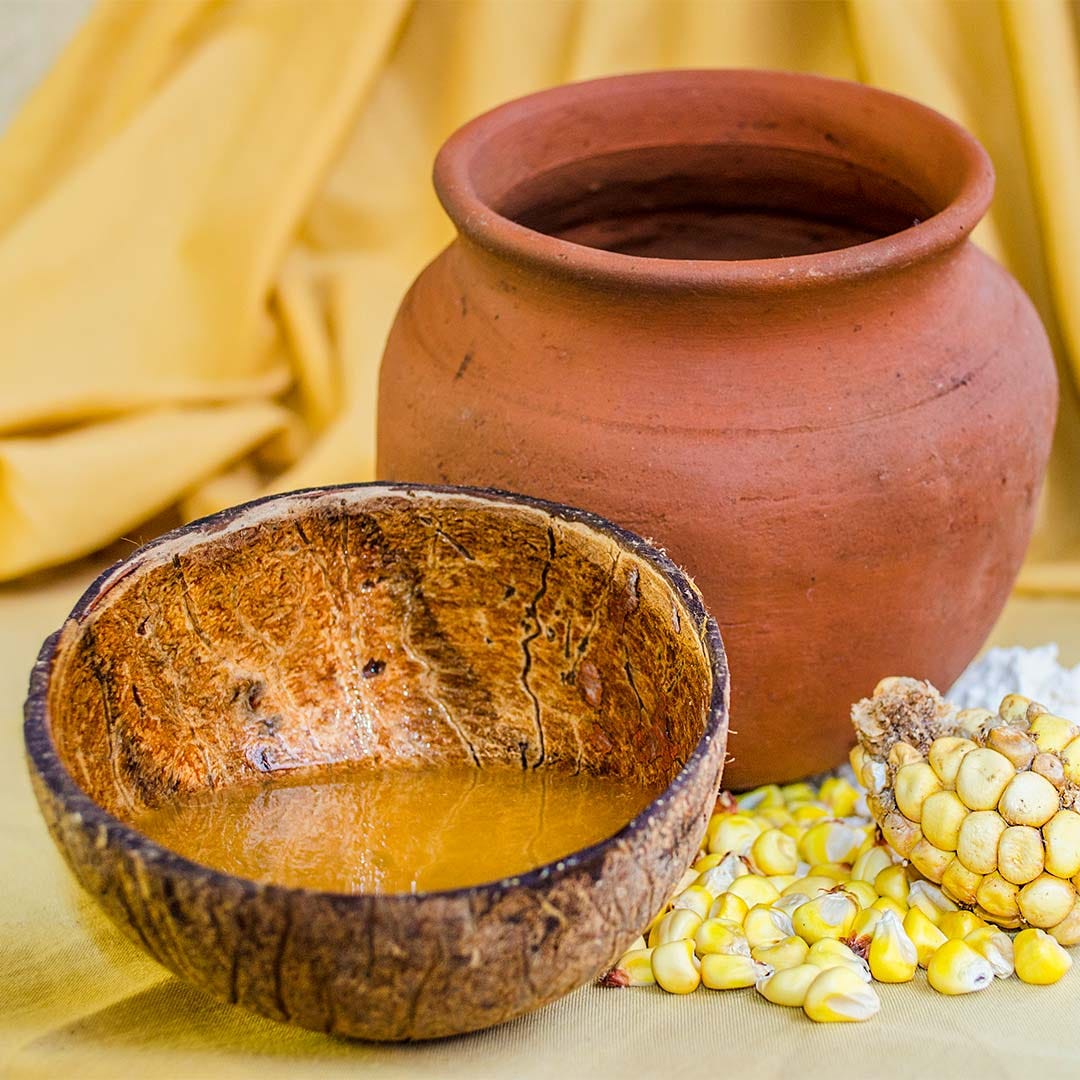 Chica de jora en jarra de barro