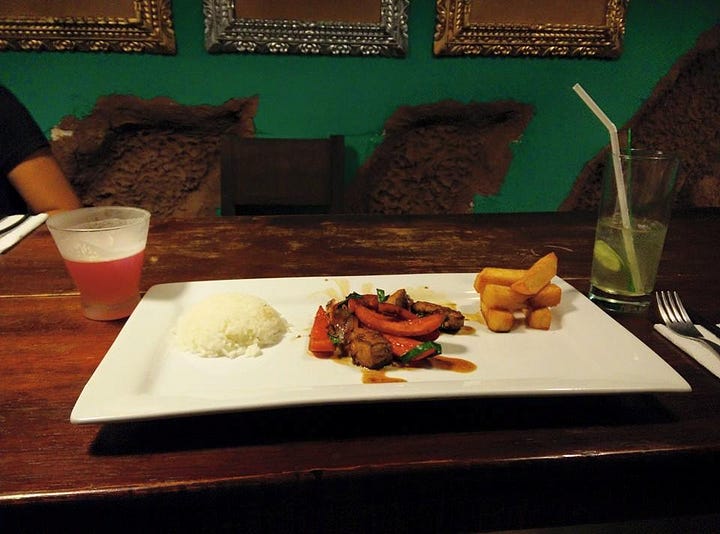 Eddie learning how to cook some Peruvian classics, such as Lomo Saltado