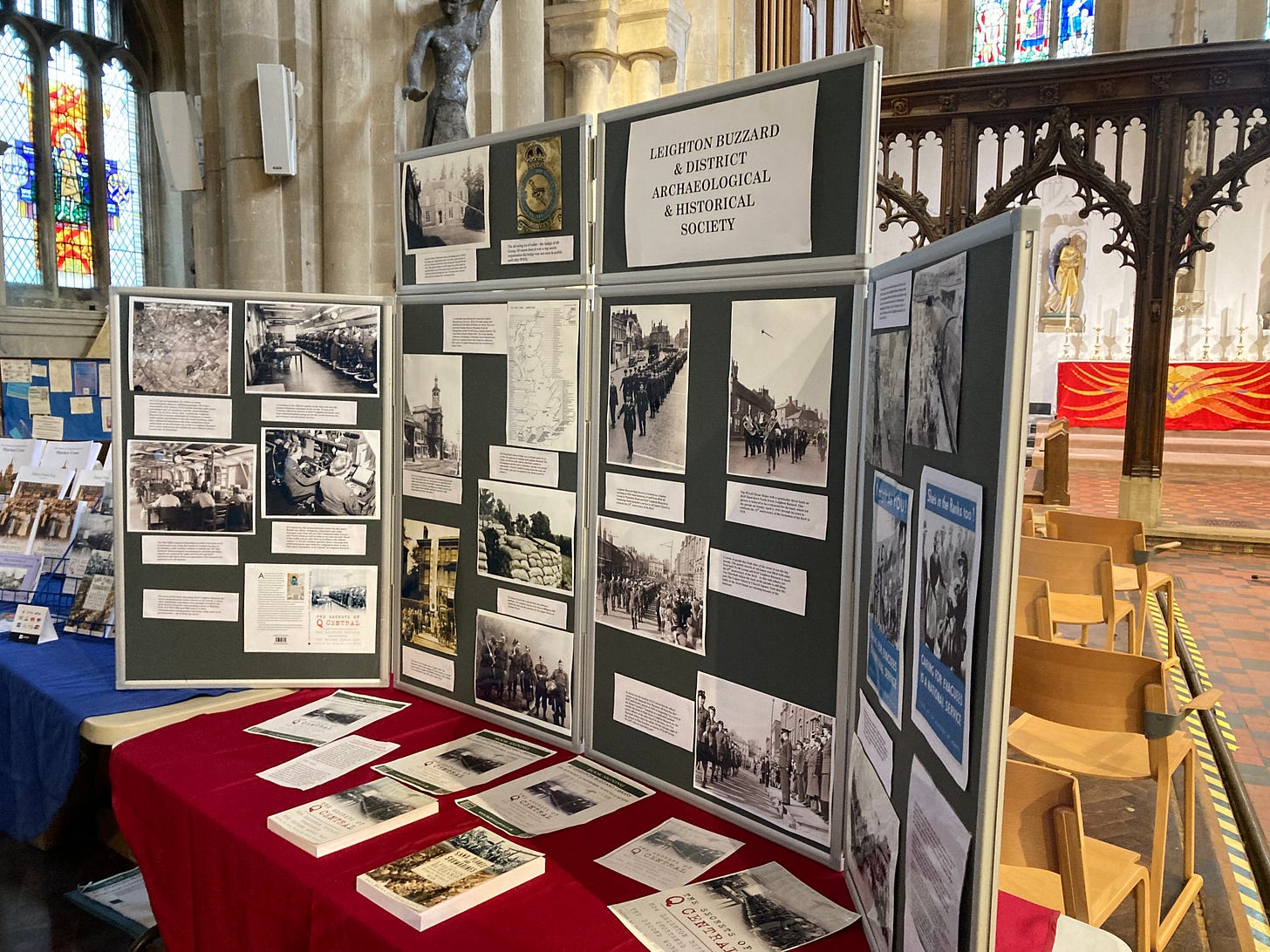 Display boards set up in Dunstable Priory Church. Showing photos of Leighton Buzzard in WW2