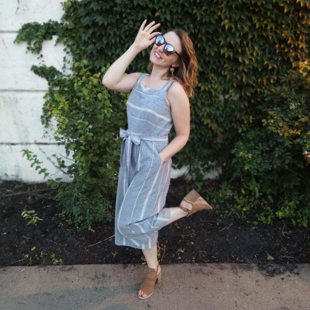 Styling the finished jumpsuit with sunglasses and heels