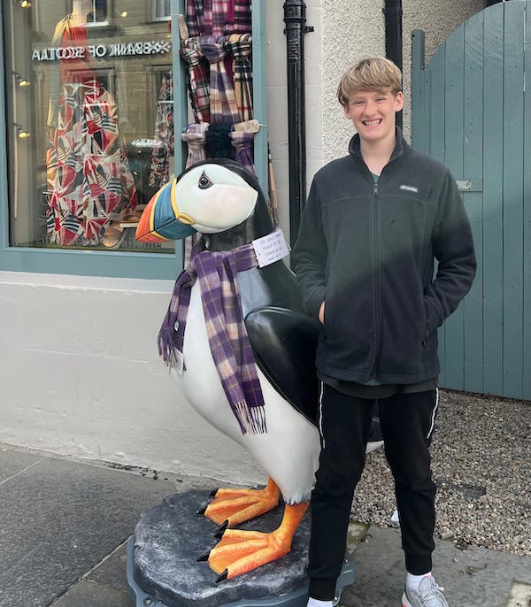 2025-6-26 Hudson with a giant puffin in Kirkwall Scotland, photo by author