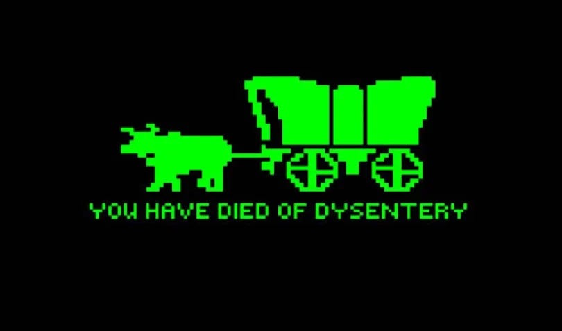 Pixelated picture of a covered wagon from the computer game Oregon Trail
