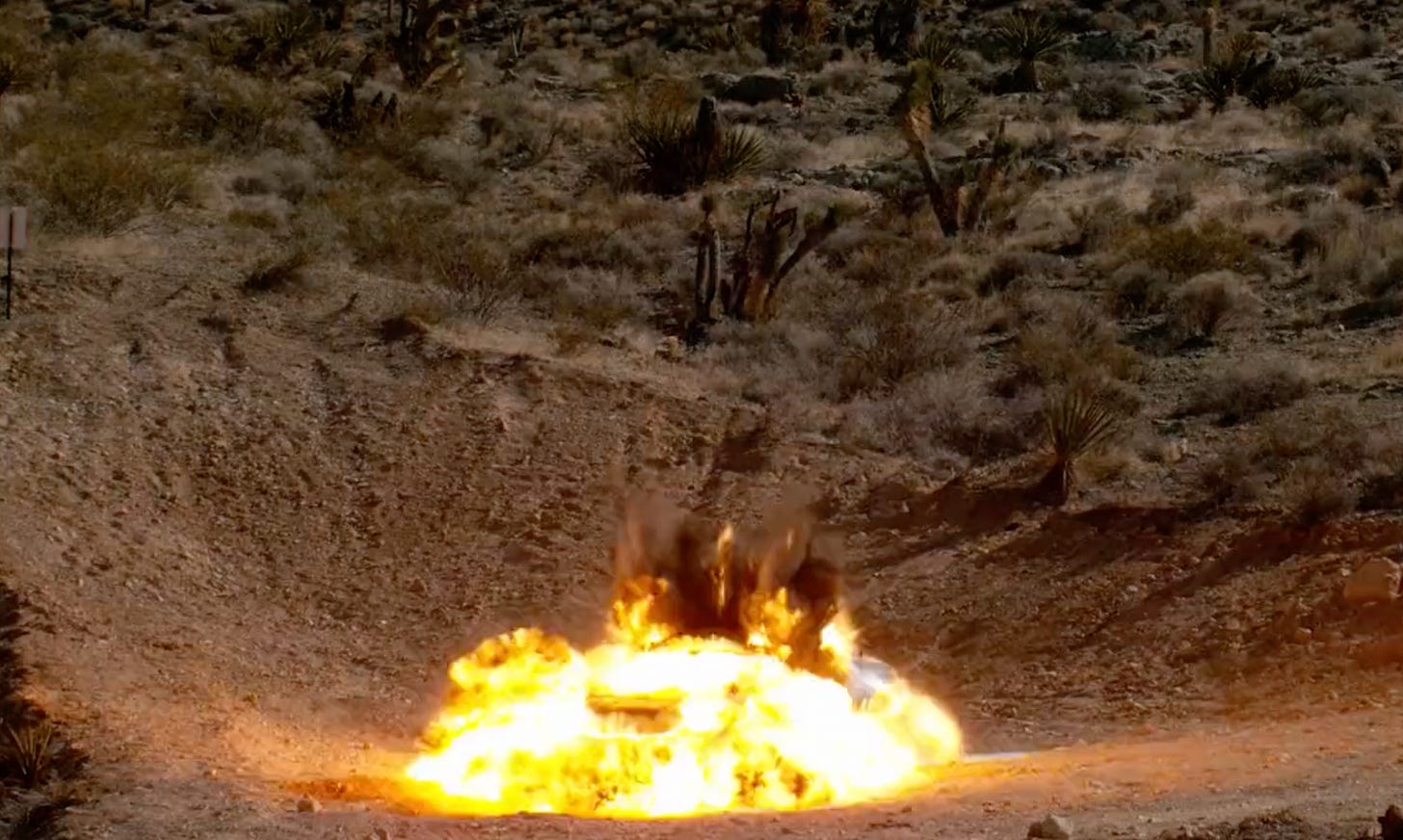 A car just after explosives in it detonate