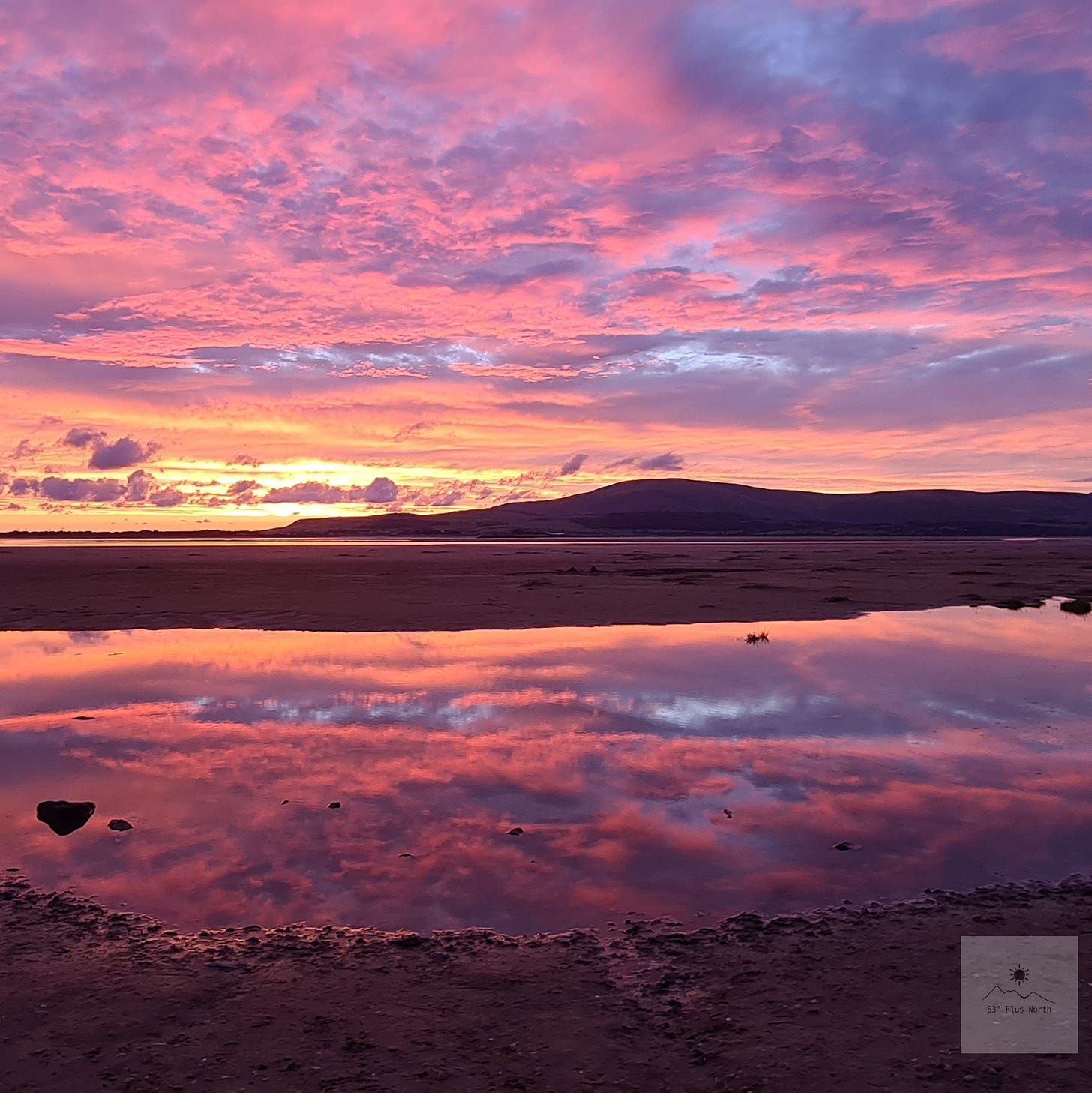 looking across the Duddon Estuary from Askam-in-Furness beach to Black Combe at sunset on a summer evening