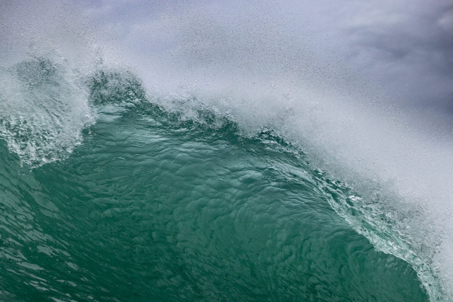 Surface tension binds the smooth water face until force tears it apart, AI generated Surface tension binds the smooth water face until force tears it apart, AI generated
