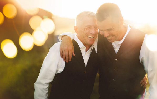 Derek & David at their wedding in 2016. Photography by Jeff Newsom Derek & David at their wedding in 2016. Photography by Jeff Newsom