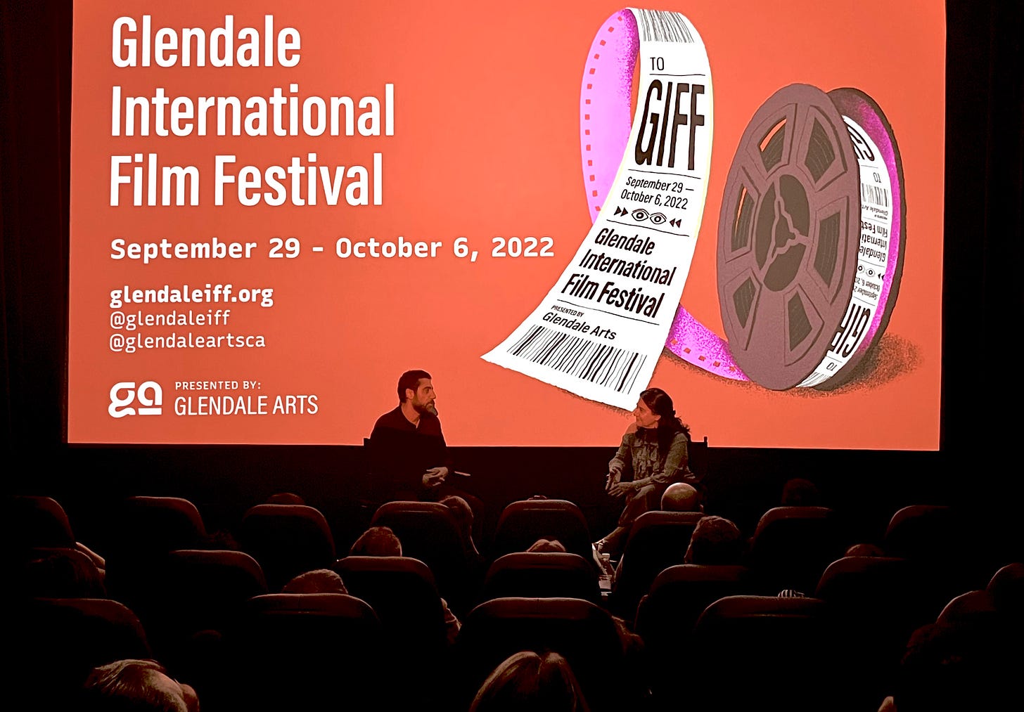 Photo of Bianca Bagatourian holding a panel discussion at the Glendale International Film Festival, 2022, with filmmaker Von Kochar for his feature film, ITALIAN FOR TRAVELERS Photo of Bianca Bagatourian holding a panel discussion at the Glendale International Film Festival, 2022, with filmmaker Von Kochar for his feature film, ITALIAN FOR TRAVELERS