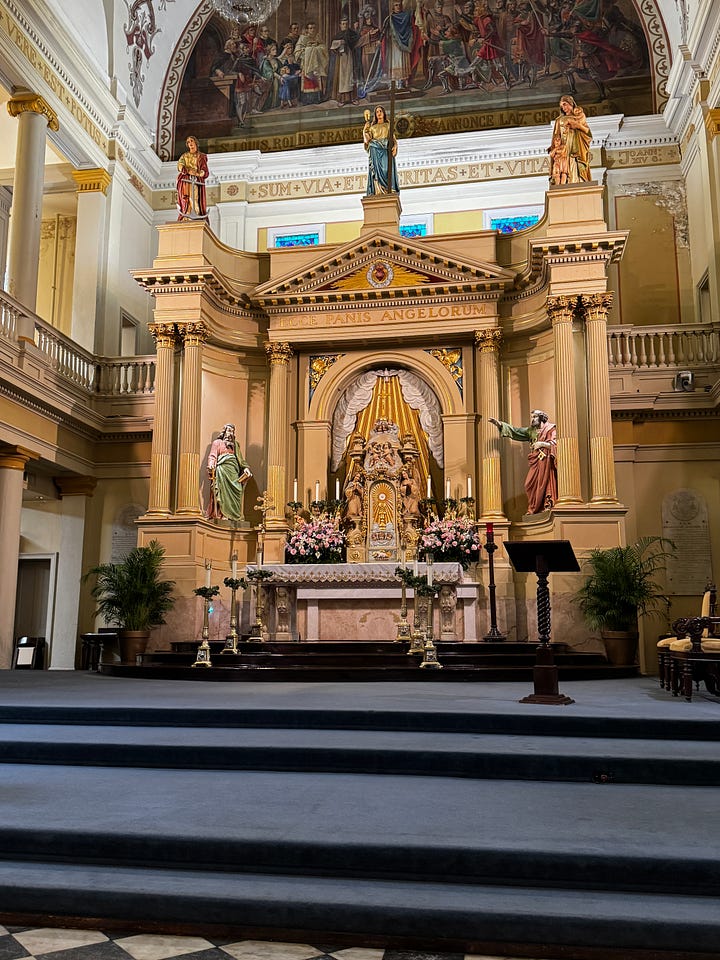 Scenes from New Orleans: Altar in St. Louis Cathedral; Kelvin the oyster shucker behind the bar at Crescent City Brewhouse; beignets at Cafe Du Monde; the Natchez sternwheeler at dock.