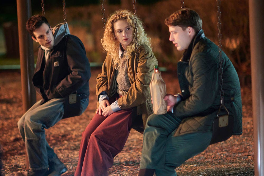 LINE OF FIRE -- "Pilot" -- Pictured: (l-r) Tommy O'Brien as Mike "Micah" Hollingsworth Jr., Kat Cunning as Clare Hollingsworth, Taylor Bloom as Russ Hollingsworth on a swing set at night in the dark talking about Jack LINE OF FIRE -- "Pilot" -- Pictured: (l-r) Tommy O'Brien as Mike "Micah" Hollingsworth Jr., Kat Cunning as Clare Hollingsworth, Taylor Bloom as Russ Hollingsworth on a swing set at night in the dark talking about Jack