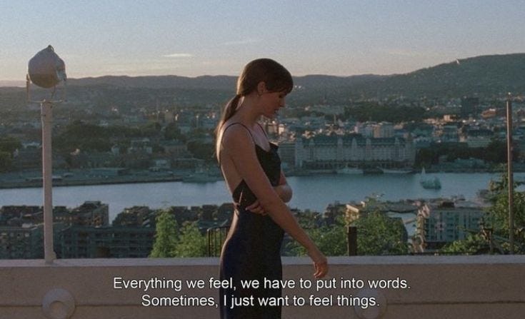 This may contain: a woman standing on top of a roof next to a cityscape with the words everything we feel, we have to put into words sometimes i just want to tell things