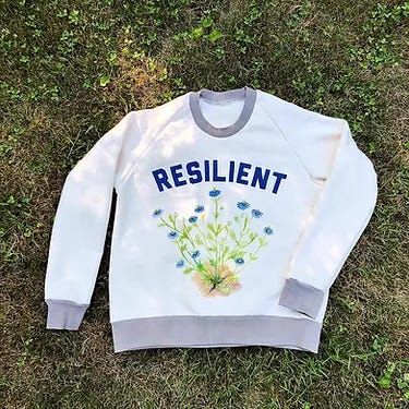 A classic beanie, custom baseball hat, sweatshirt