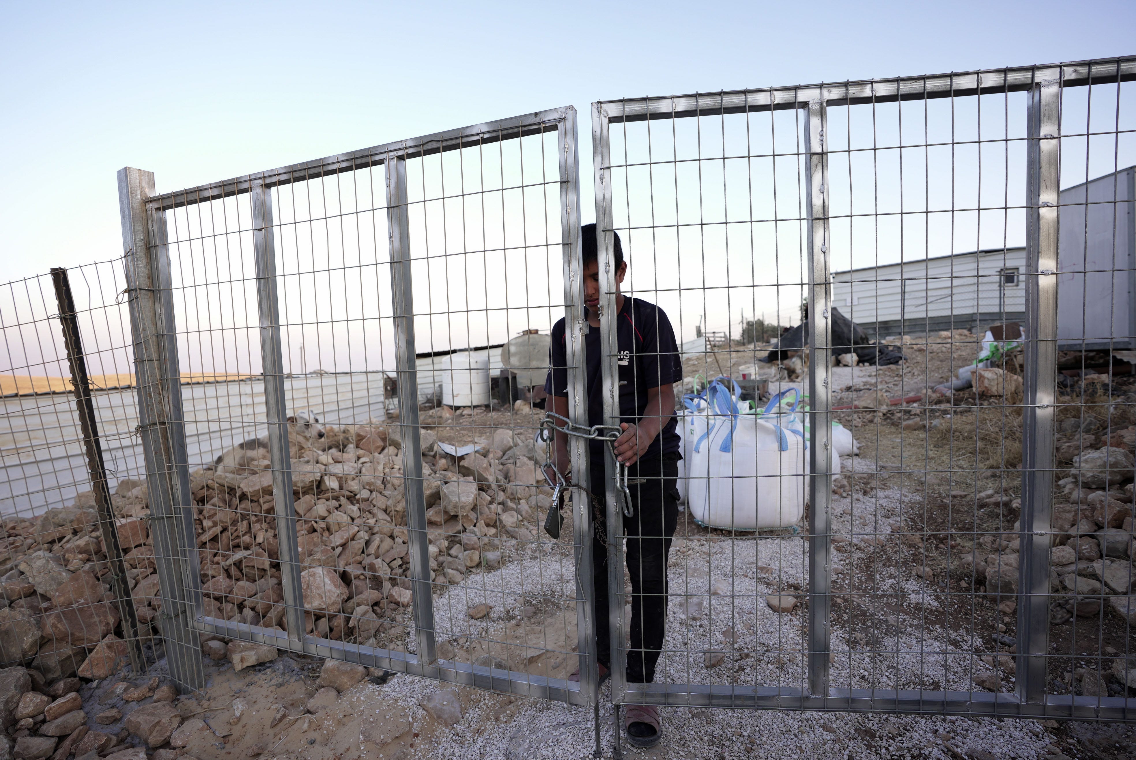 Israeli military closes Palestinian village while settlers attack, residents say