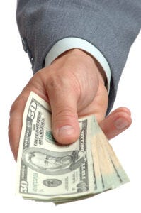 hand holding out money