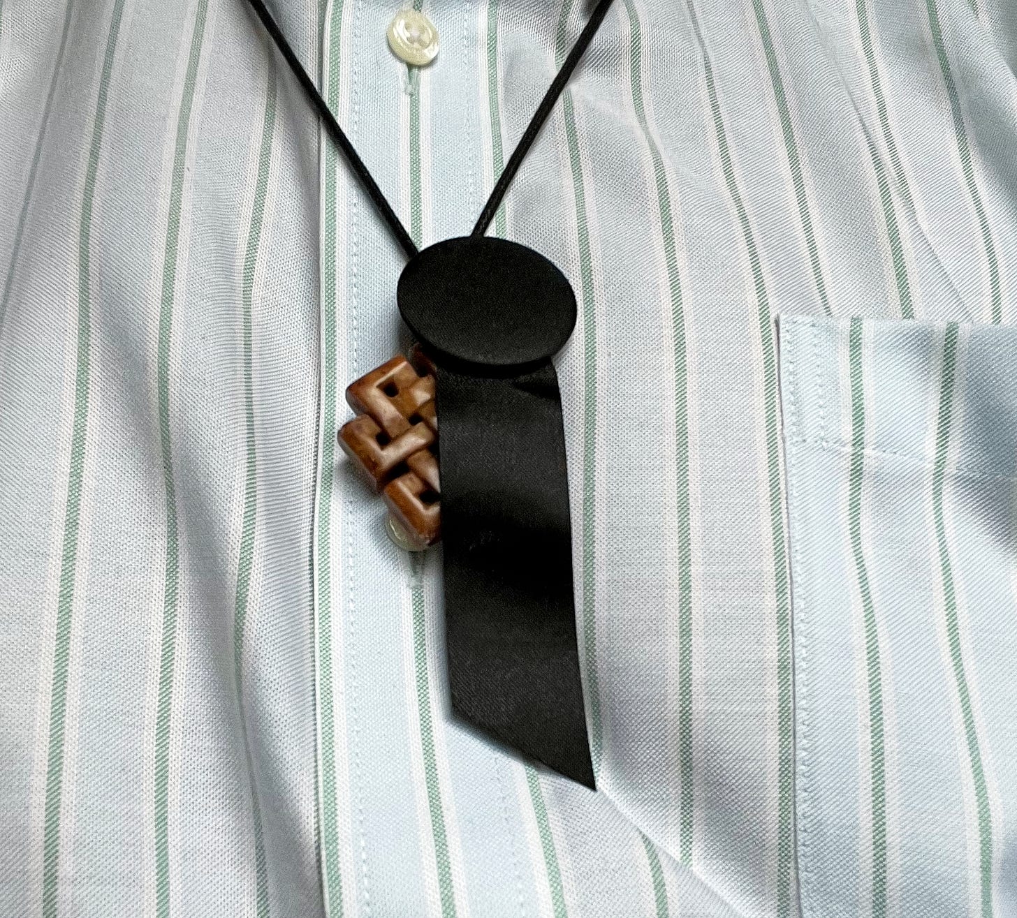 Photo of black ribbon on Mel's short
