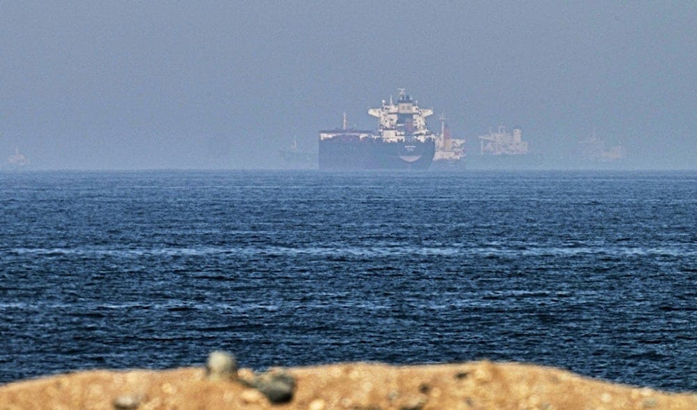 Cargo ships are seen at sea near the Strait of Hormuz, as viewed from a rocky shoreline near Khor Fakkan, United Arab Emirates, Friday, May 1, 2026. (AP) Cargo ships are seen at sea near the Strait of Hormuz, as viewed from a rocky shoreline near Khor Fakkan, United Arab Emirates, Friday, May 1, 2026. (AP)