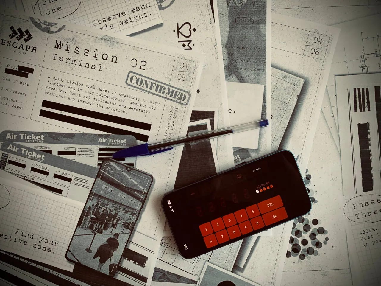 Escape Team: Mission 02 – Terminal printable escape room materials with mission documents, air tickets, and escape plan sheets set in an airport terminal.