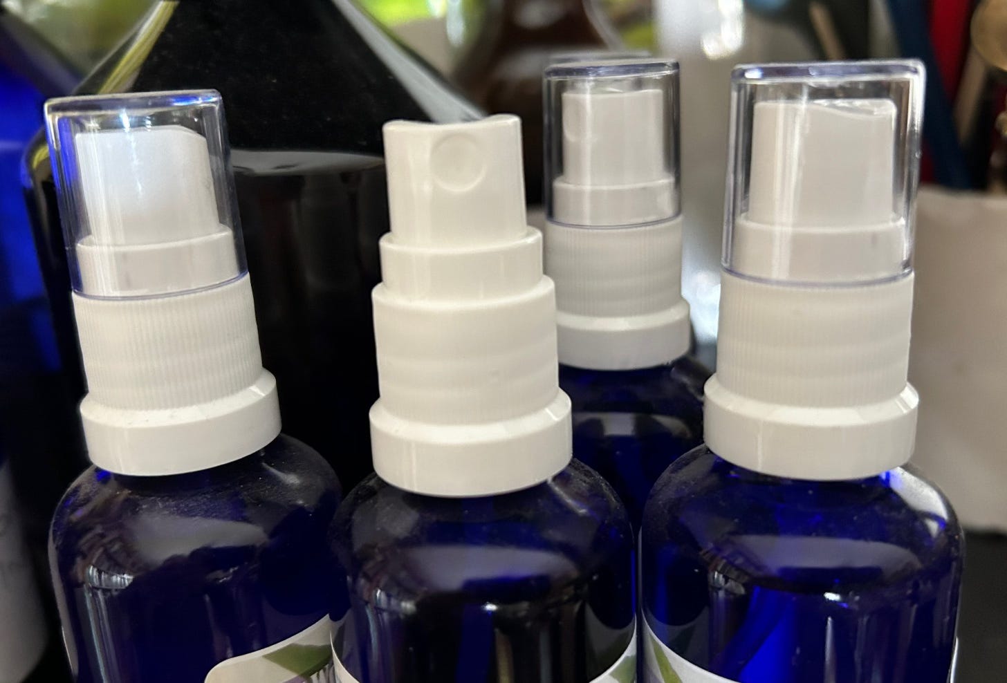 White plastic spray tops for bottles
