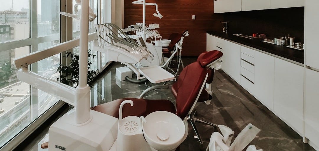 red and white leather padded chair