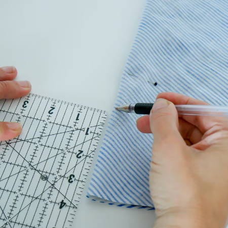 mark one side of the cutout on a circular piece of fabric mark one side of the cutout on a circular piece of fabric